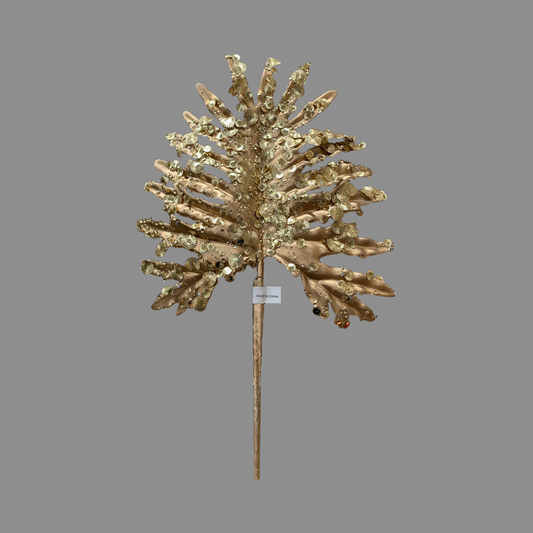 Hoja de palma dorada con lentejuelas