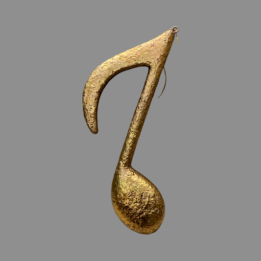 Nota musical dorada