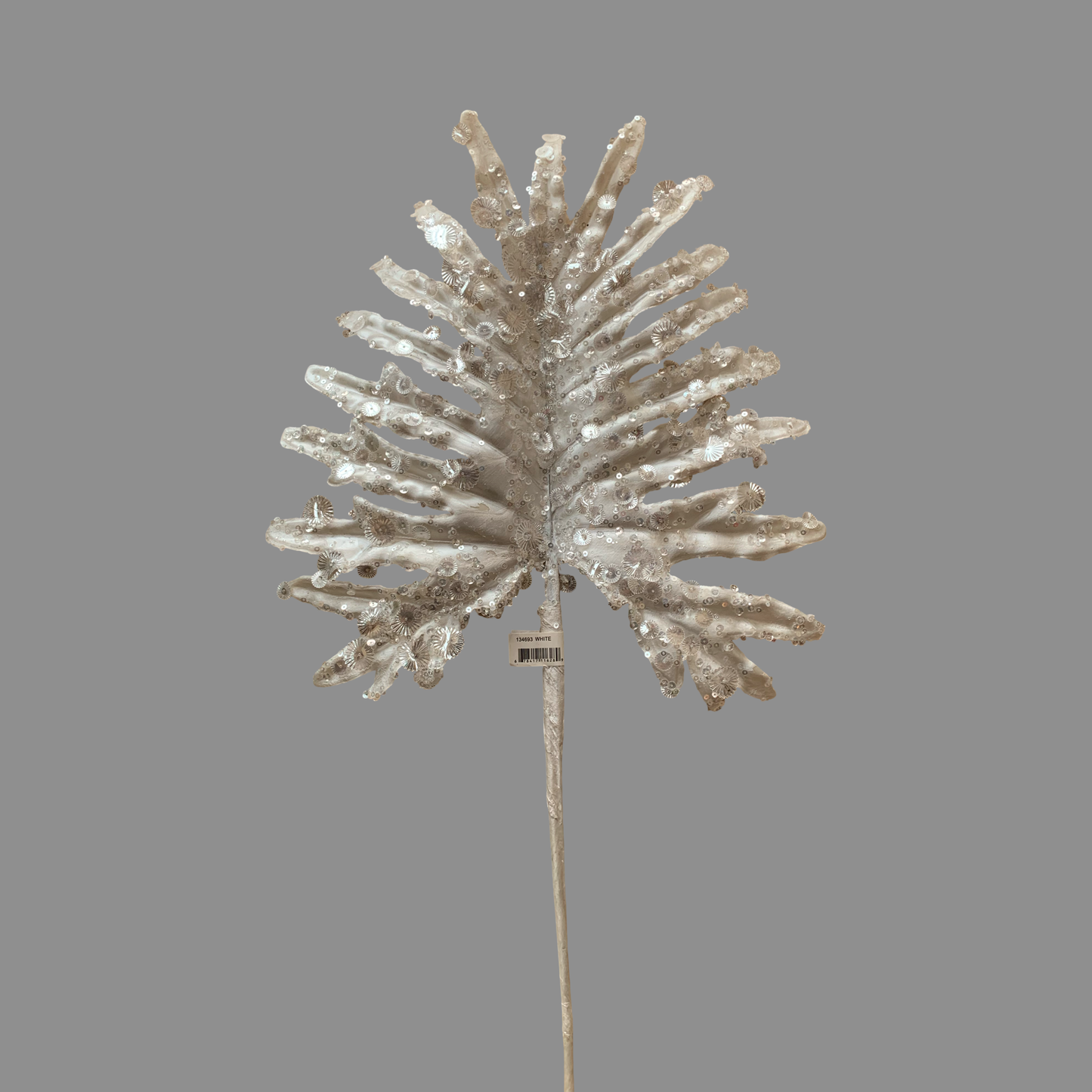 Hoja de palma blanca con lentejuelas